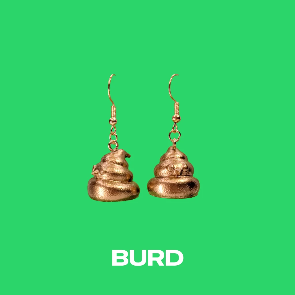 Burd gold earrings on a green background